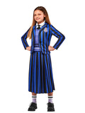 Girl wearing a Wednesday Nevermore blue and black striped jacket with crest, shirt-front vest, tie and pleated skirt
