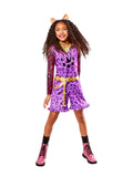 Girl in Monster High Clawdeen Wolf playsuit with purple leopard print, striped sleeves and wolf ears