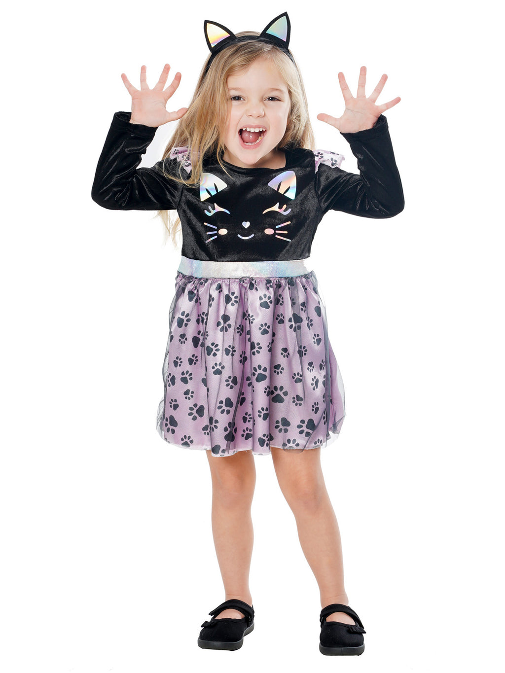 Toddler girl in the cat dress with paw print skirt, doing cat claws