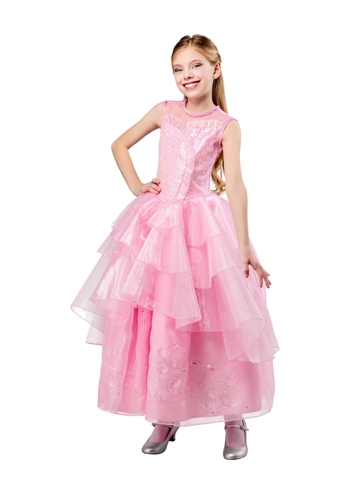 Girl in the premium Wicked Glinda gown with a long pink tulle skirt and shimmery bodice