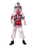 Boy in the Zombie American Football Player costume with blood-splattered white top, torn pants and helmet