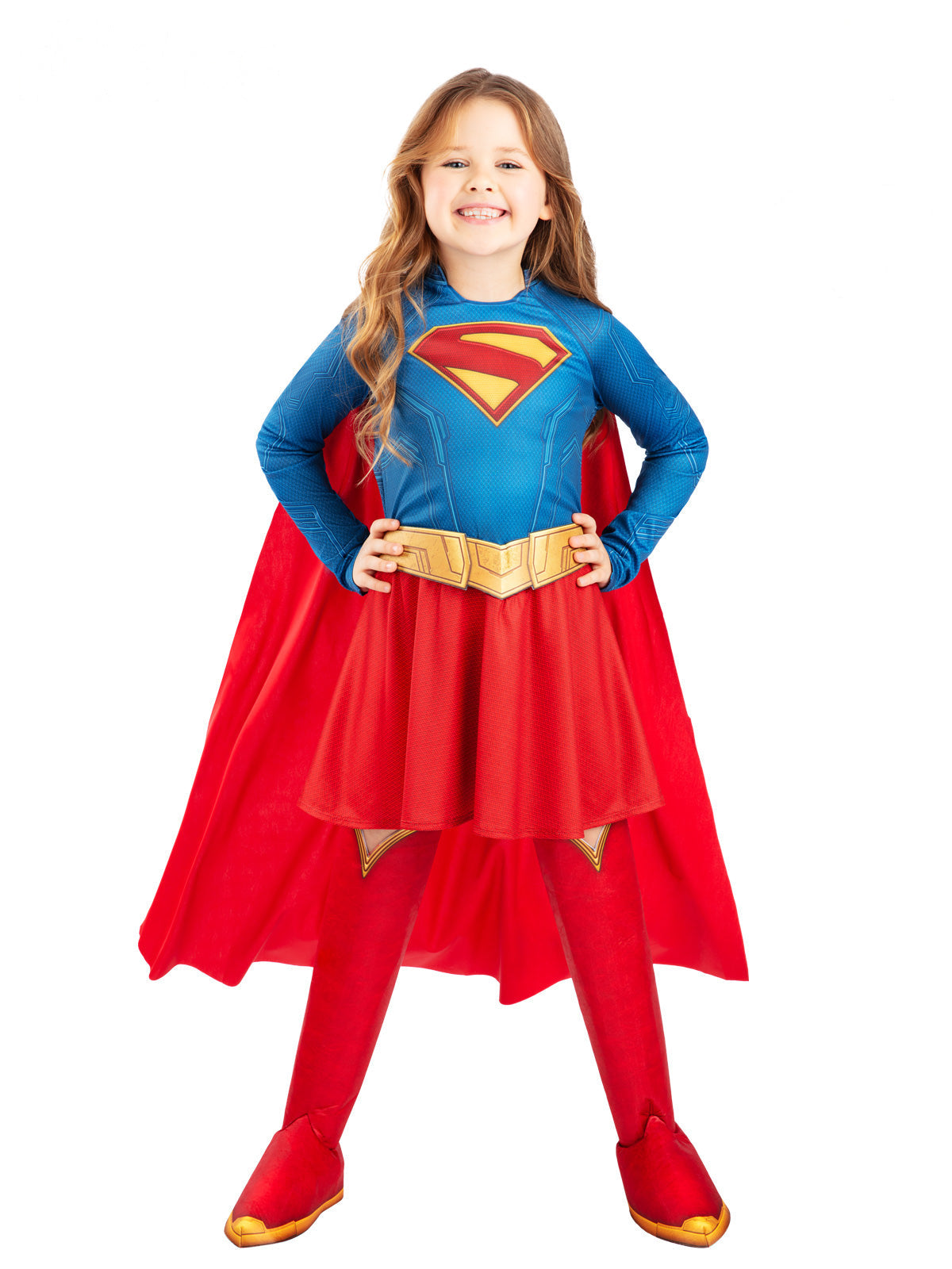 Girl in the Supergirl 2026 movie costume with a blue S-logo tutu dress, red cape and gold-trimmed boot tops