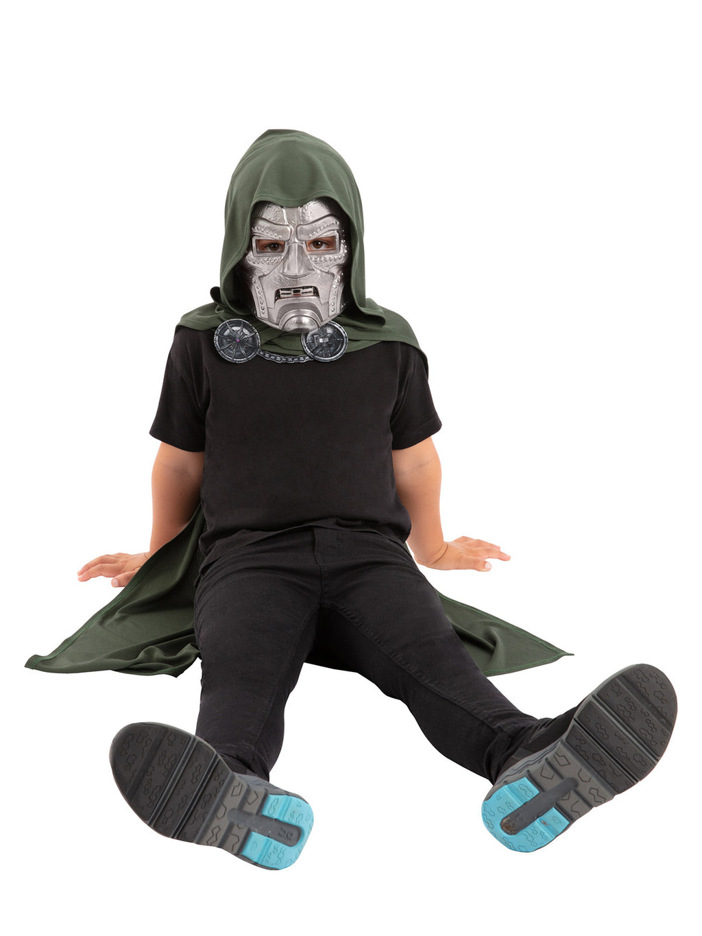 Child sitting on the floor wearing the Dr Doom hooded cape and mask