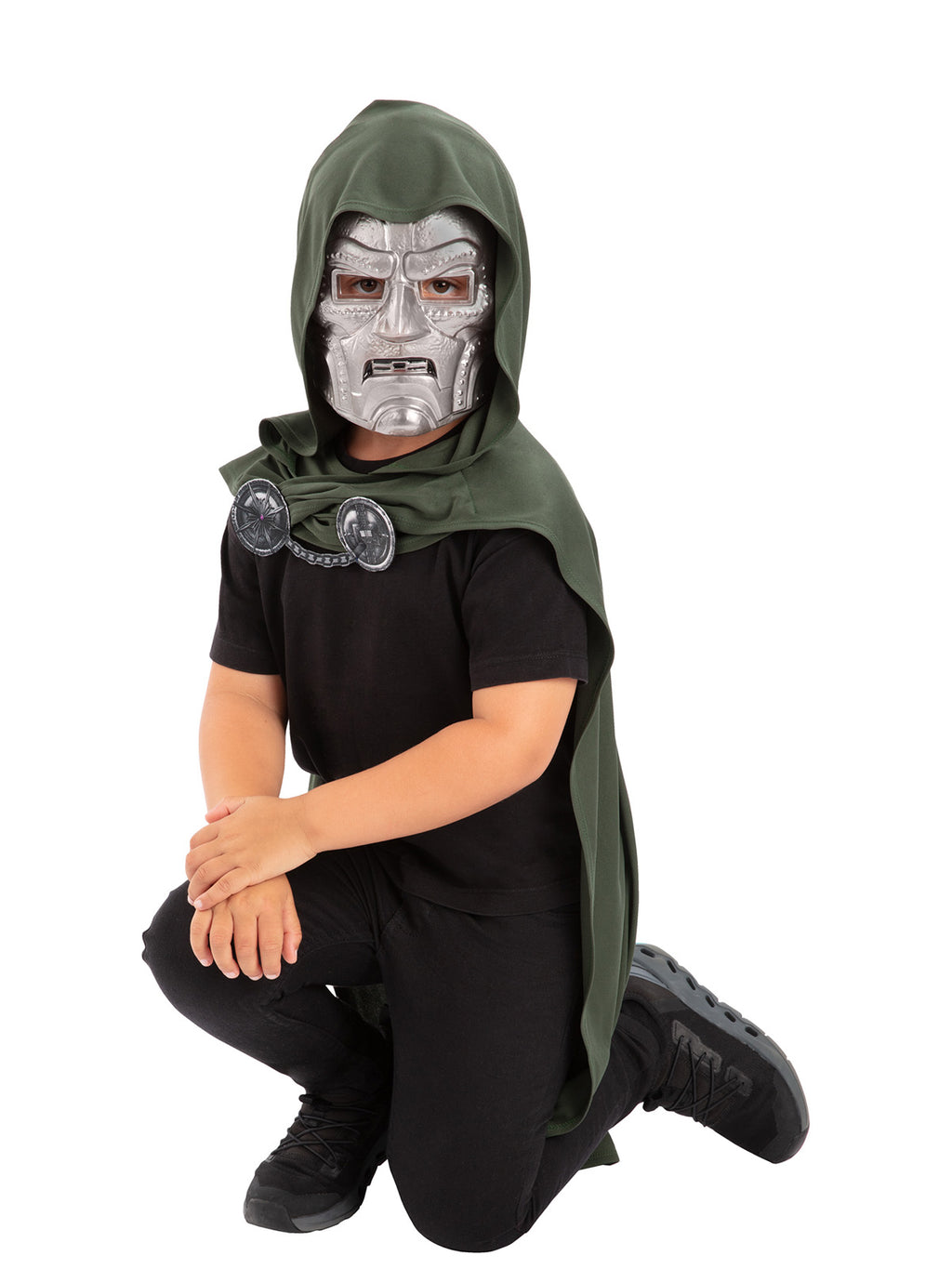 Child kneeling in the Dr Doom hooded cape and mask