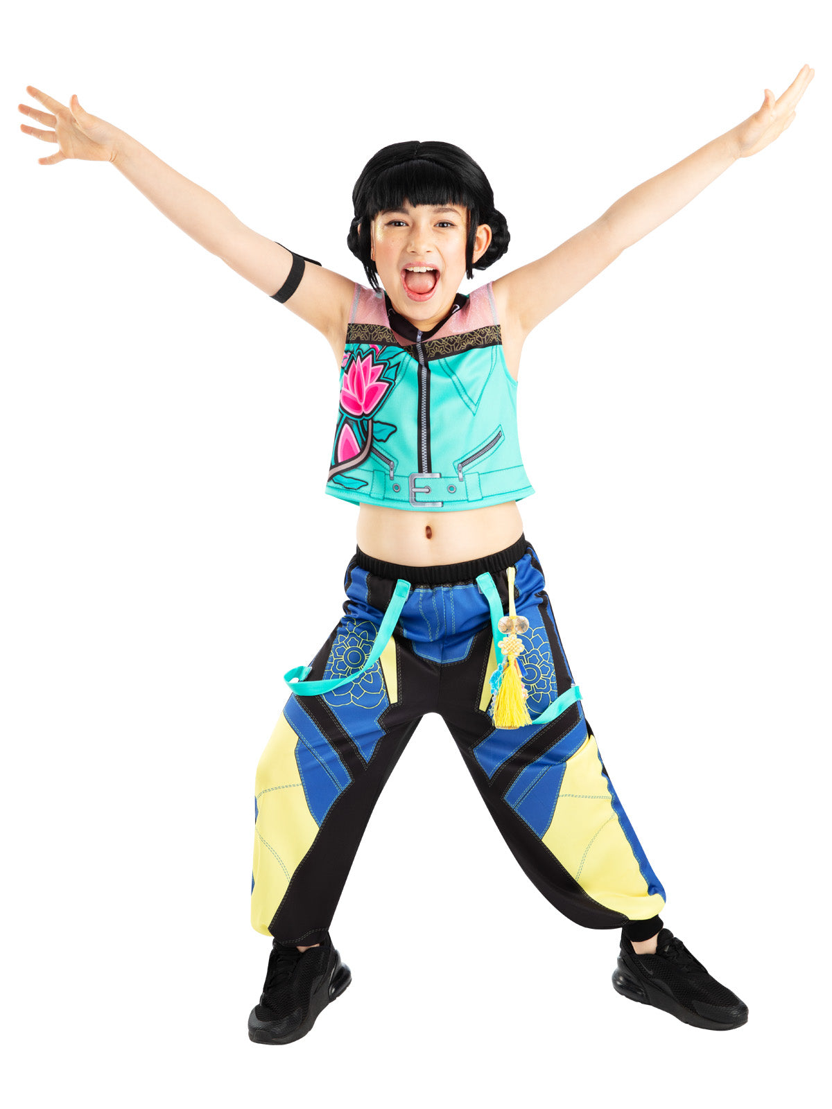 Girl cheering with arms out in the Zoey costume with a teal top and loose printed pants