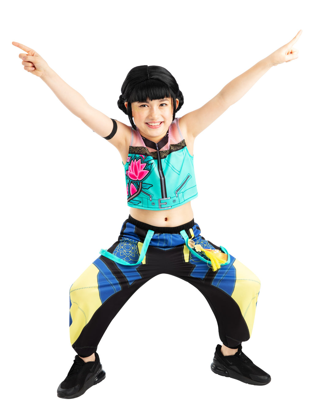 Girl striking a wide pose with arms out in the Zoey costume and printed pants
