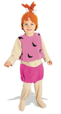 Toddler in The Flintstones Pebbles pink fleece jumpsuit with pebble-print top, pink shorts and orange top-knot headpiece