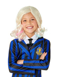 Girl wearing a wavy platinum blonde Enid wig with pink and blue tips
