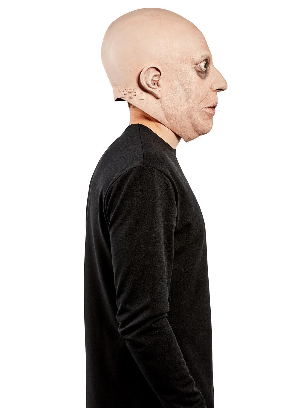 Side view of the bald Uncle Fester overhead mask