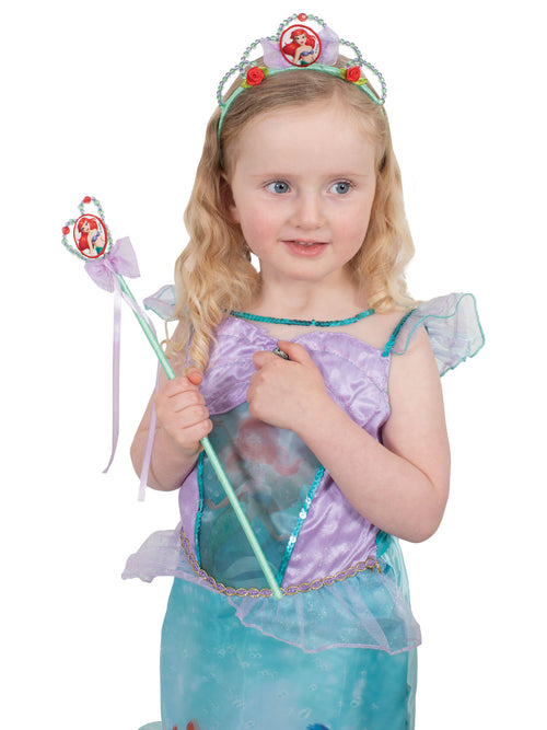 Girl in a teal and lilac Ariel-style dress wearing the beaded tiara
