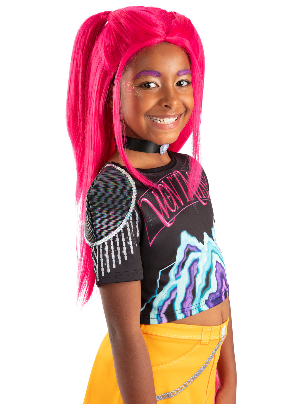 Girl in a graphic top wearing the long pink Mira wig, three-quarter view