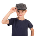 Boy wearing a grey chequered flat cap
