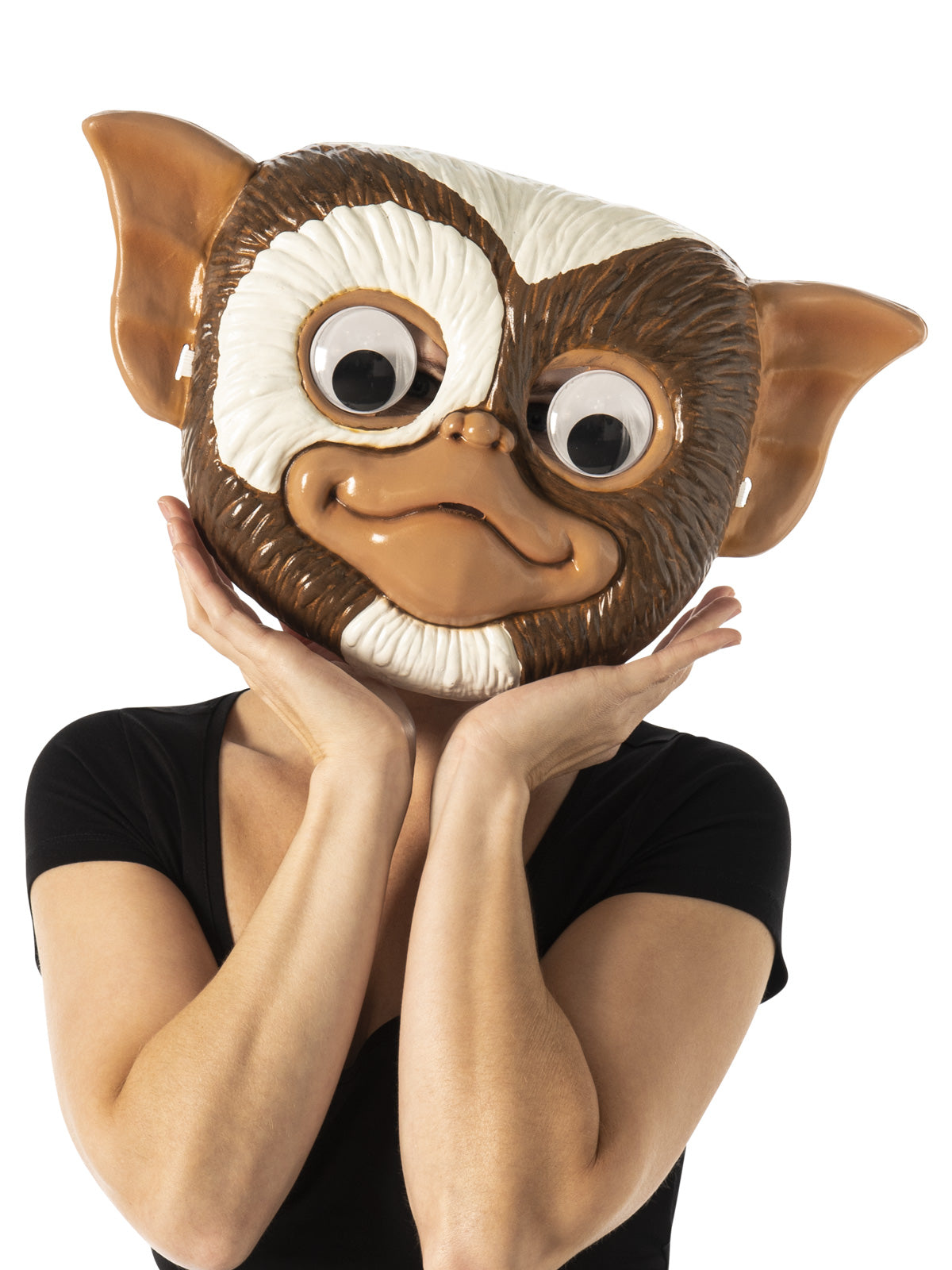 Woman wearing the brown and white Gizmo googly eyes mask with big ears