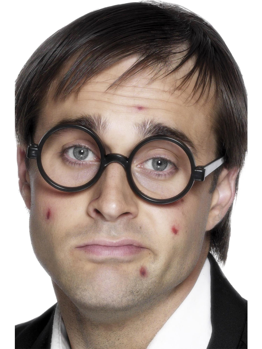 Man wearing round black schoolboy specs