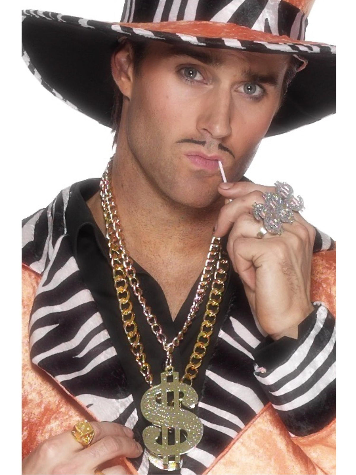 Man wearing a large gold dollar sign medallion on a thick gold chain