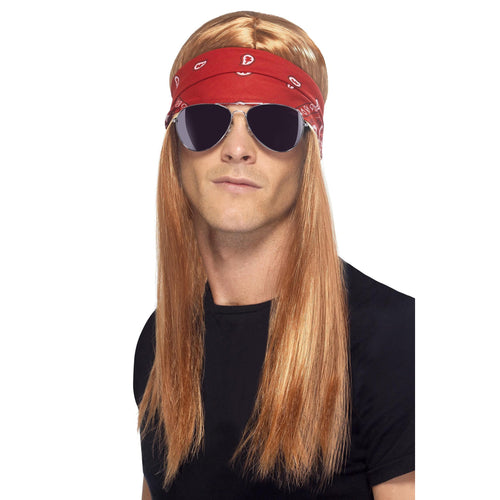 Man wearing a long straight auburn rocker wig, red bandana and dark aviator sunglasses