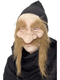 Person wearing a gold digger half face mask with black hood, bulbous nose and long ginger hair