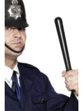 Man in a police helmet holding a black policeman's truncheon prop