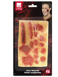 Pack of 16 flesh-coloured self-adhesive gory wounds in 12 designs