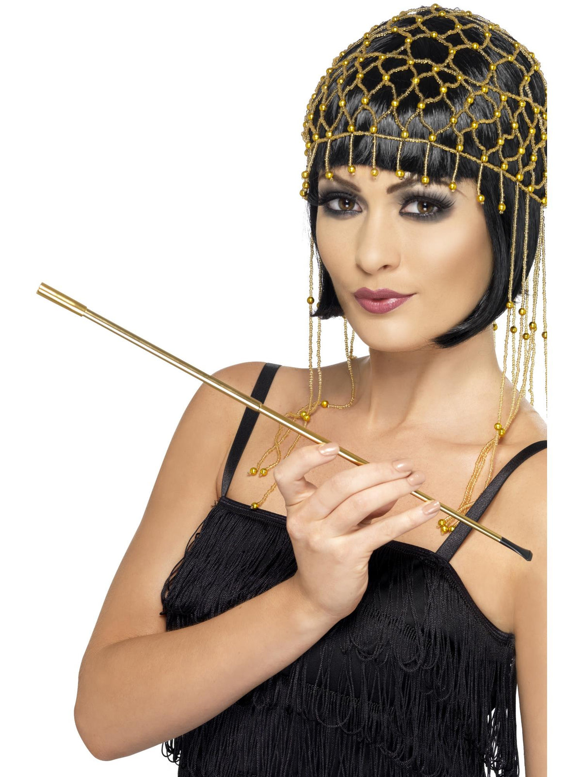 Woman holding a long gold extendable cigarette holder