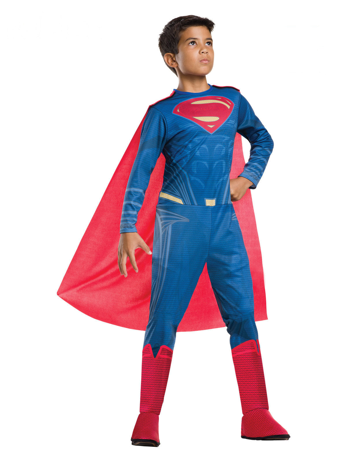Boy wearing a classic Superman jumpsuit with printed S emblem, attached red boot covers and detachable cape