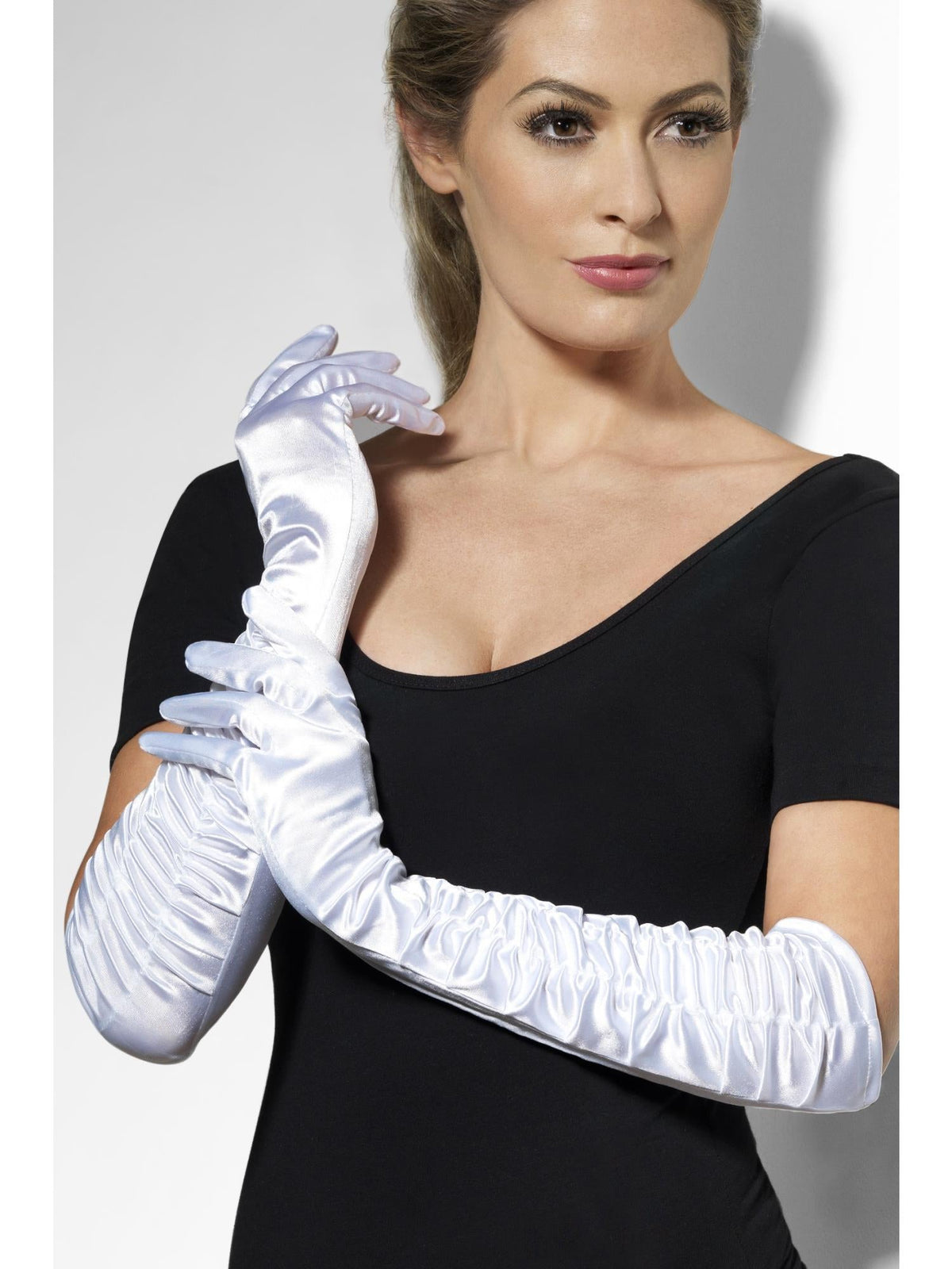 Woman wearing long white satin temptress gloves with ruched sleeves
