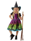 Girl in the Ombre Witch dress with a purple to green printed skirt, haunted house scene and tall pointed hat