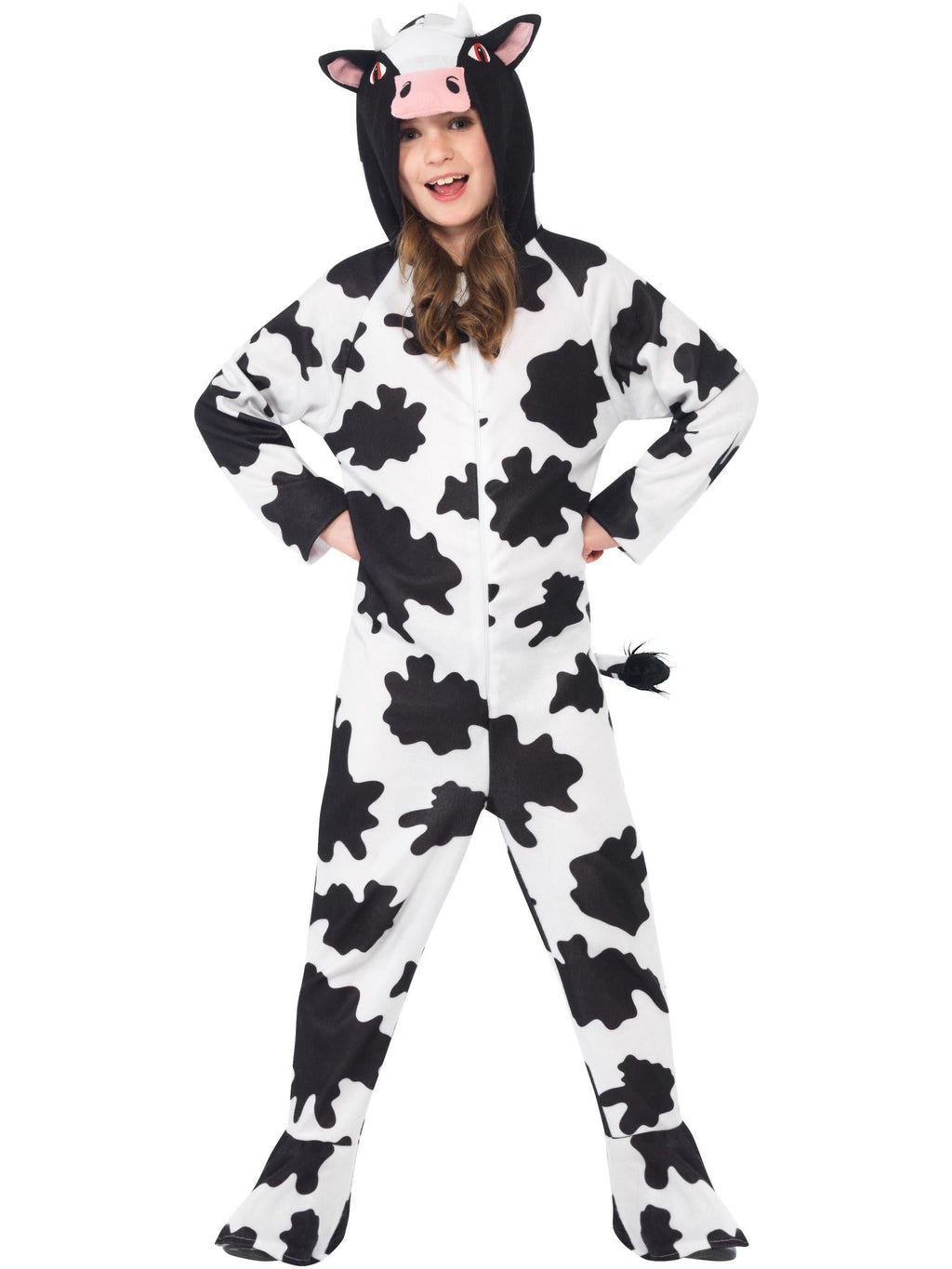 Child in cow print hooded onesie with horned hood, standing hands on hips