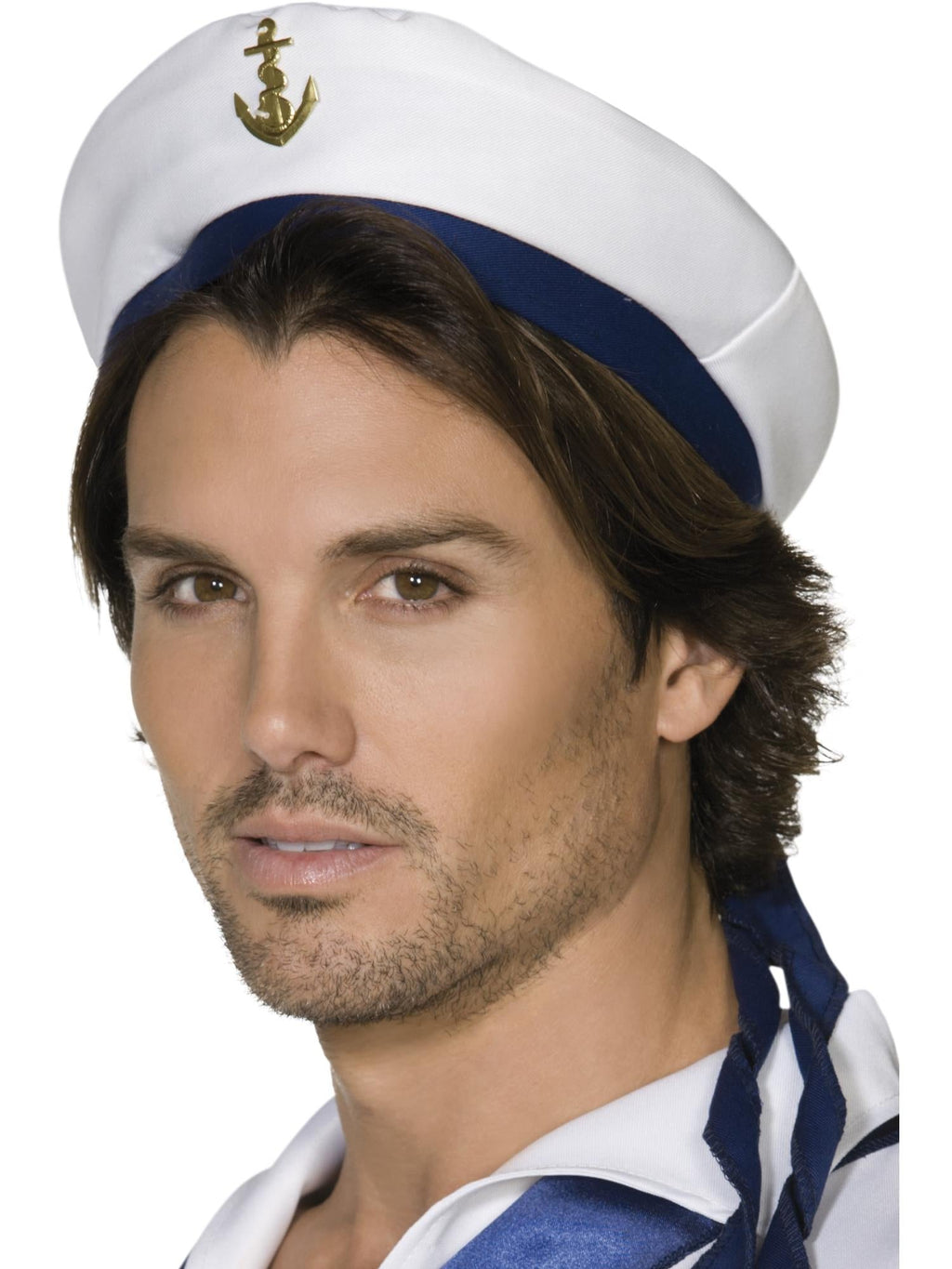 Man wearing a white sailor hat with navy band and gold anchor badge