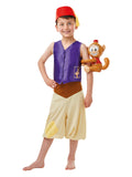 Boy in Aladdin costume with purple vest, cream knickerbocker pants, red hat and inflatable Abu monkey