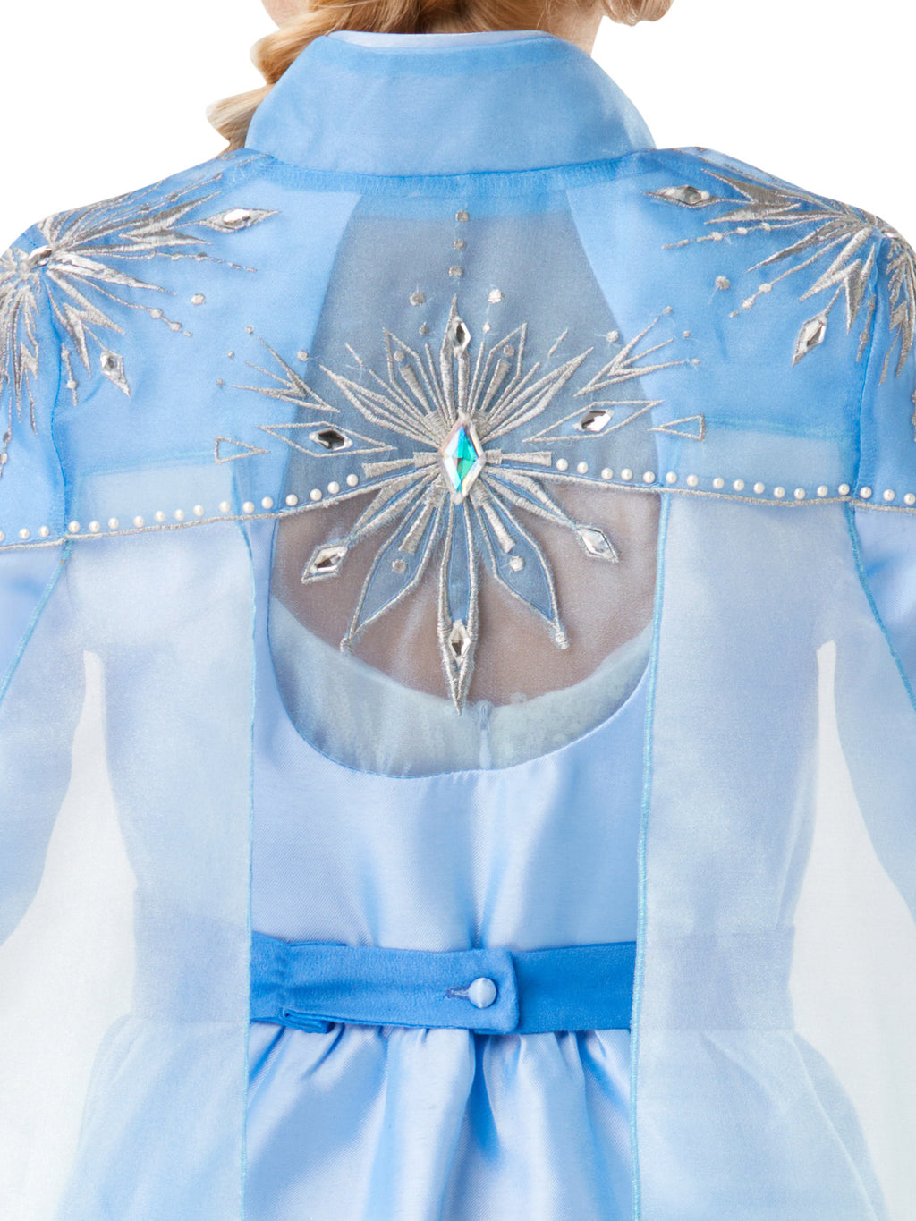 Back view of the Elsa travel coat with embroidered snowflake panel and blue belt