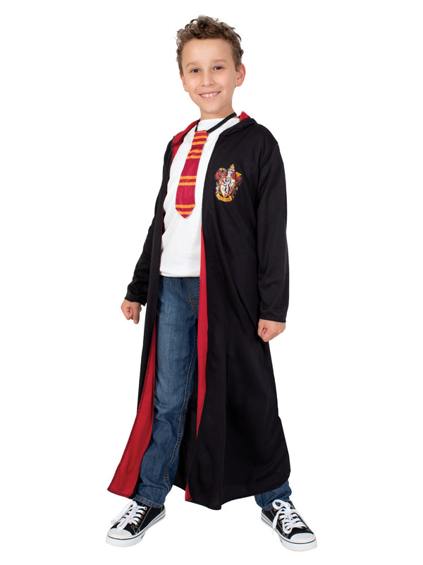 Boy in the Harry Potter hooded robe, black with red lining and Gryffindor crest, and a striped tie