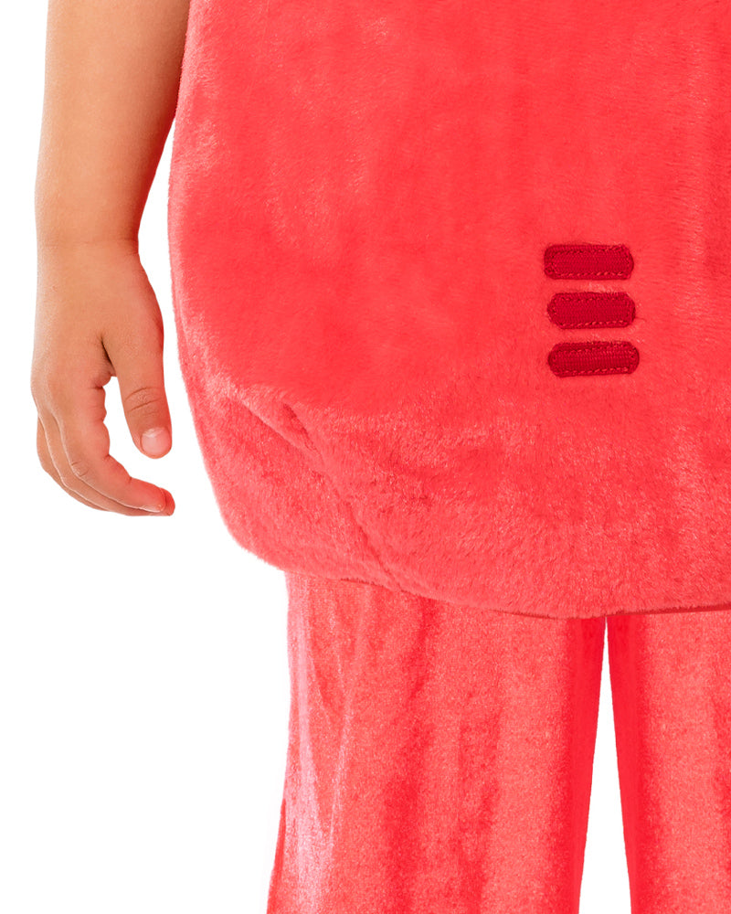 Close-up of the Oddbods Fuse red faux fur padded tummy with printed buttons