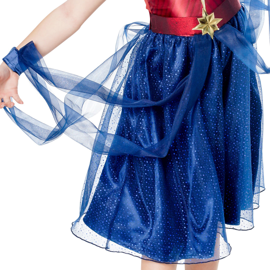 Close-up of the Captain Marvel dress's layered blue tulle skirt, sheer wings and gold star belt