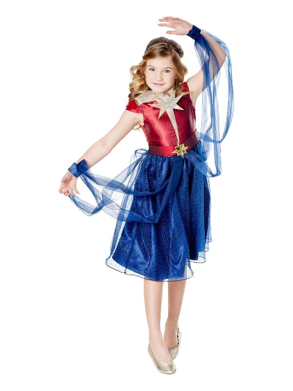 Girl in The Marvels Captain Marvel dress with red star bodice, blue tulle skirt and sheer wings
