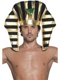Man wearing a black and gold striped pharaoh headpiece with green cobra emblem
