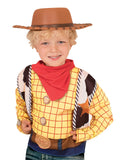 Boy in a Woody outfit wearing the brown Woody cowboy hat