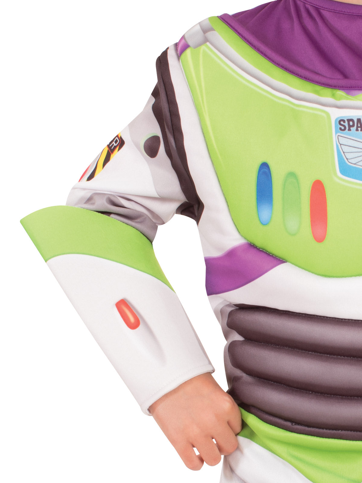 Close-up of the Buzz Lightyear jumpsuit's printed chest controls and green gauntlet