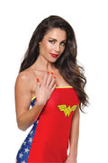Woman showing Wonder Woman nail decals on her fingernails