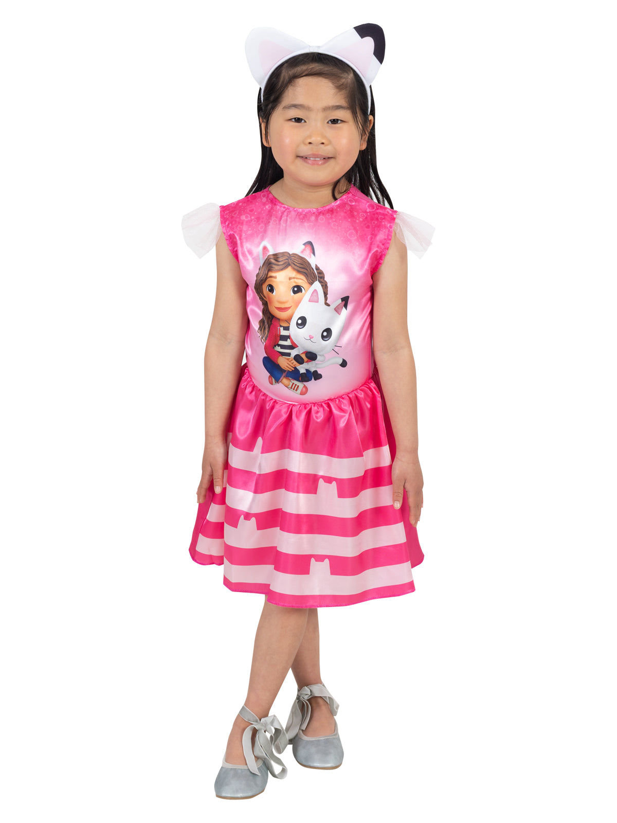 Girl standing in the Gabby's Dollhouse costume with tulle sleeves