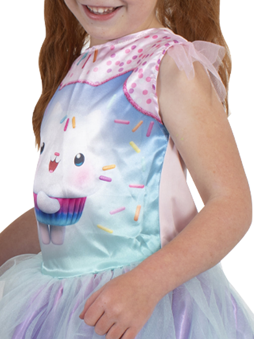 Close-up of the Cakey Cat dress bodice with character print and pink tulle sleeves