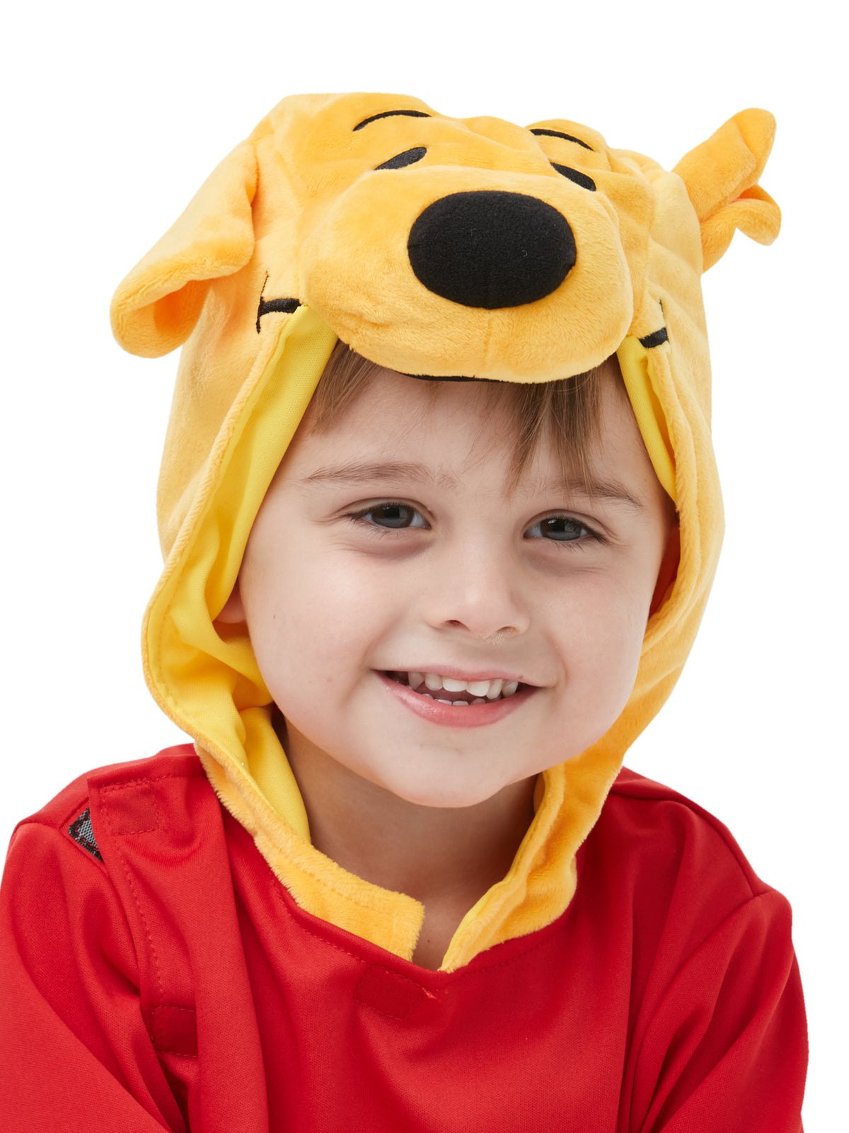 Smiling toddler wearing the Winnie The Pooh Deluxe hood with 3D nose and ears