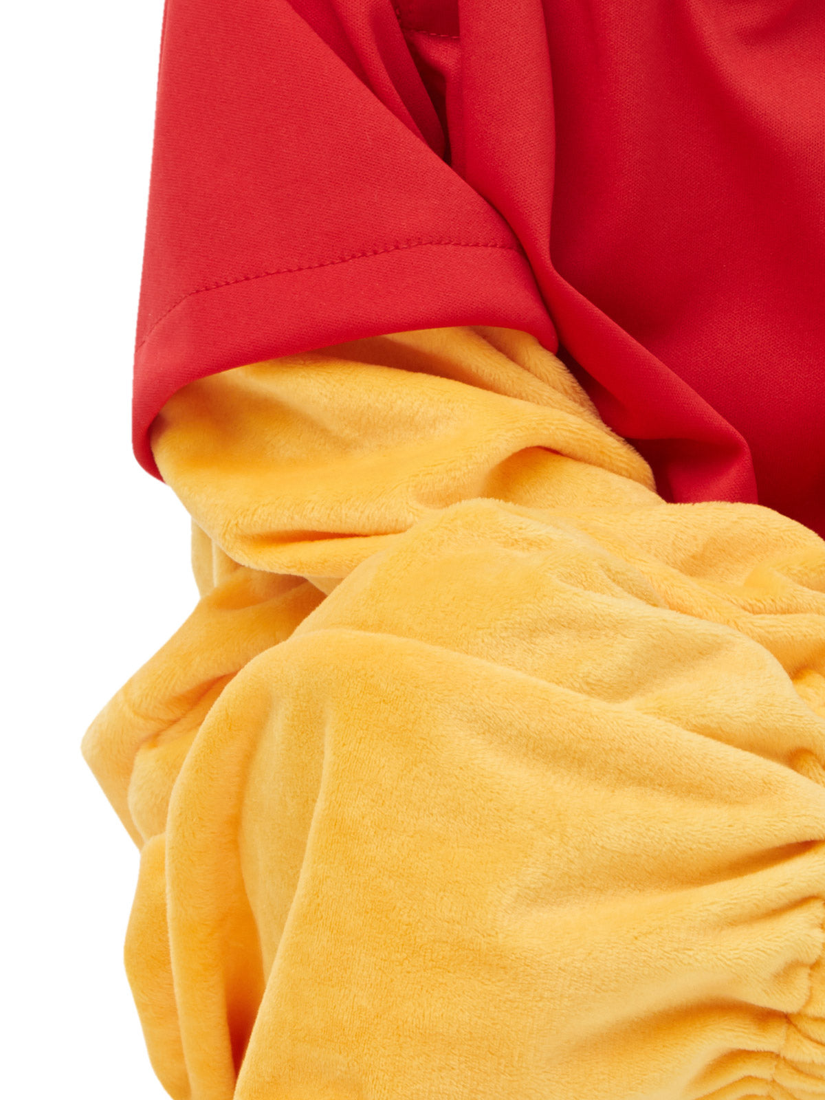 Close-up of the Winnie The Pooh Deluxe red sleeve and soft yellow fleece jumpsuit