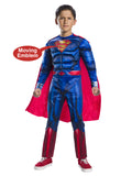 Boy in a deluxe Superman padded muscle jumpsuit with lenticular moving S emblem and red cape