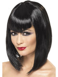 Woman wearing a black vamp wig in a shoulder-length bob with a straight fringe
