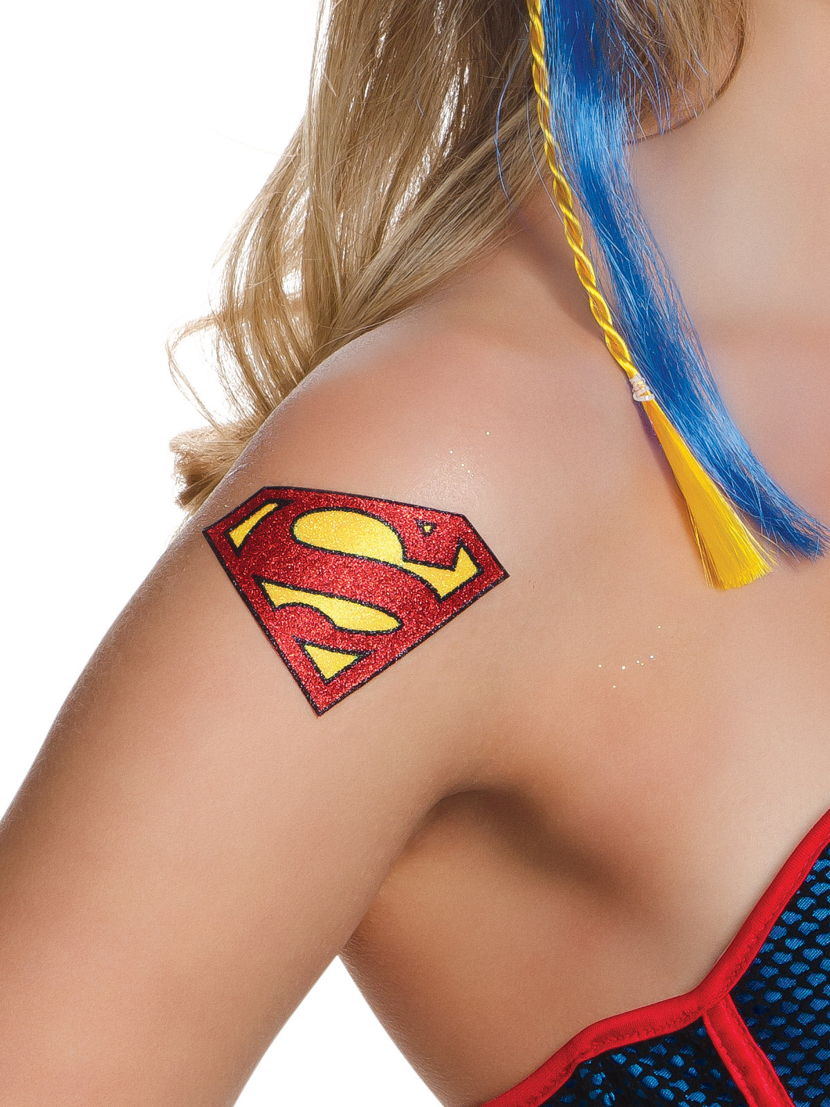 Close-up of the Supergirl symbol tattoo and blue and yellow hair extension