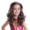 Girl wearing a long curly brown Wonder Woman wig
