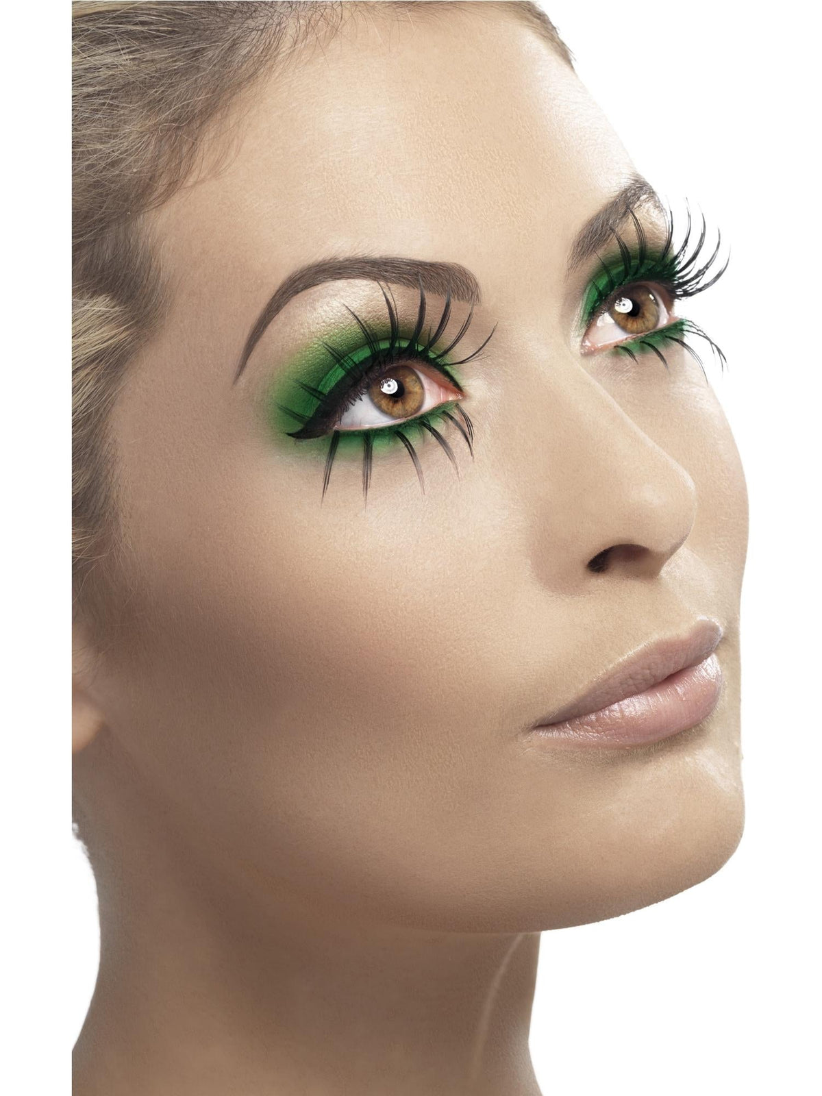 Close-up of green glitter false eyelashes