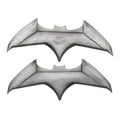 Two silver metallic plastic Batarangs in bat emblem shape