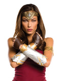 Woman wearing the Wonder Woman silver gauntlets and gold tiara